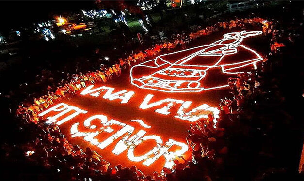 Ilonggo devotees light 6K candles to form giant Sto. Niño image
