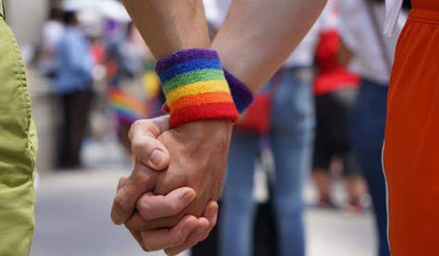 Globe to provide equal benefits to legal dependents of same-sex couples