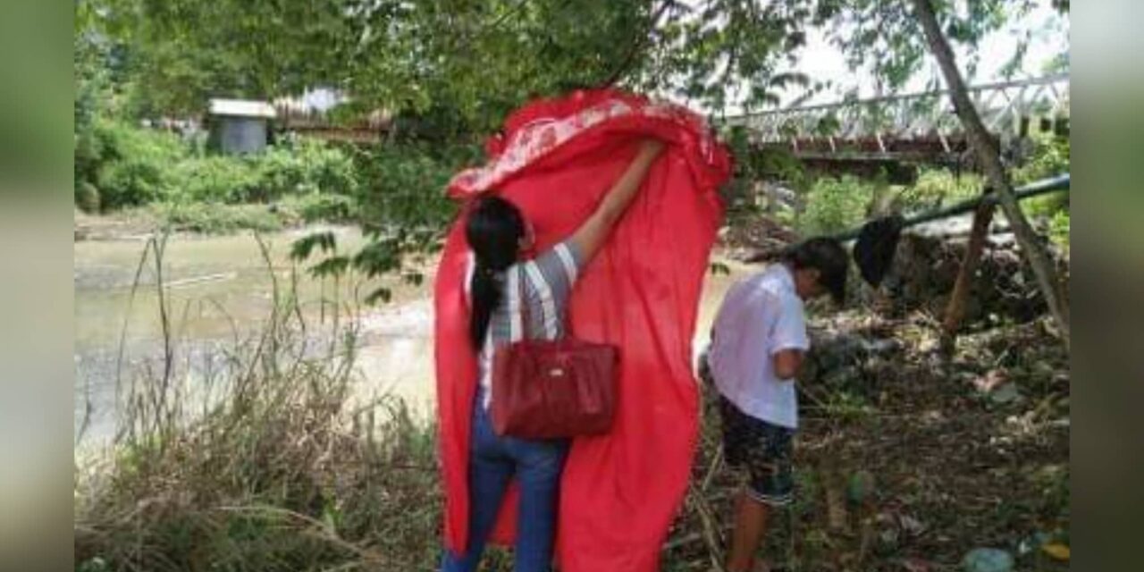 Bike-riding teachers take photos of grads as academic year ends