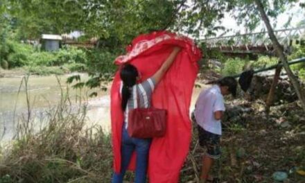 Bike-riding teachers take photos of grads as academic year ends
