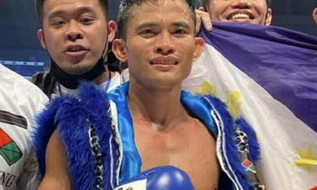 Pinoy boxer knocks out Japanese foe, claims world champion belt