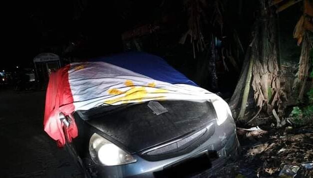 Man arrested for using PH flag as car cover